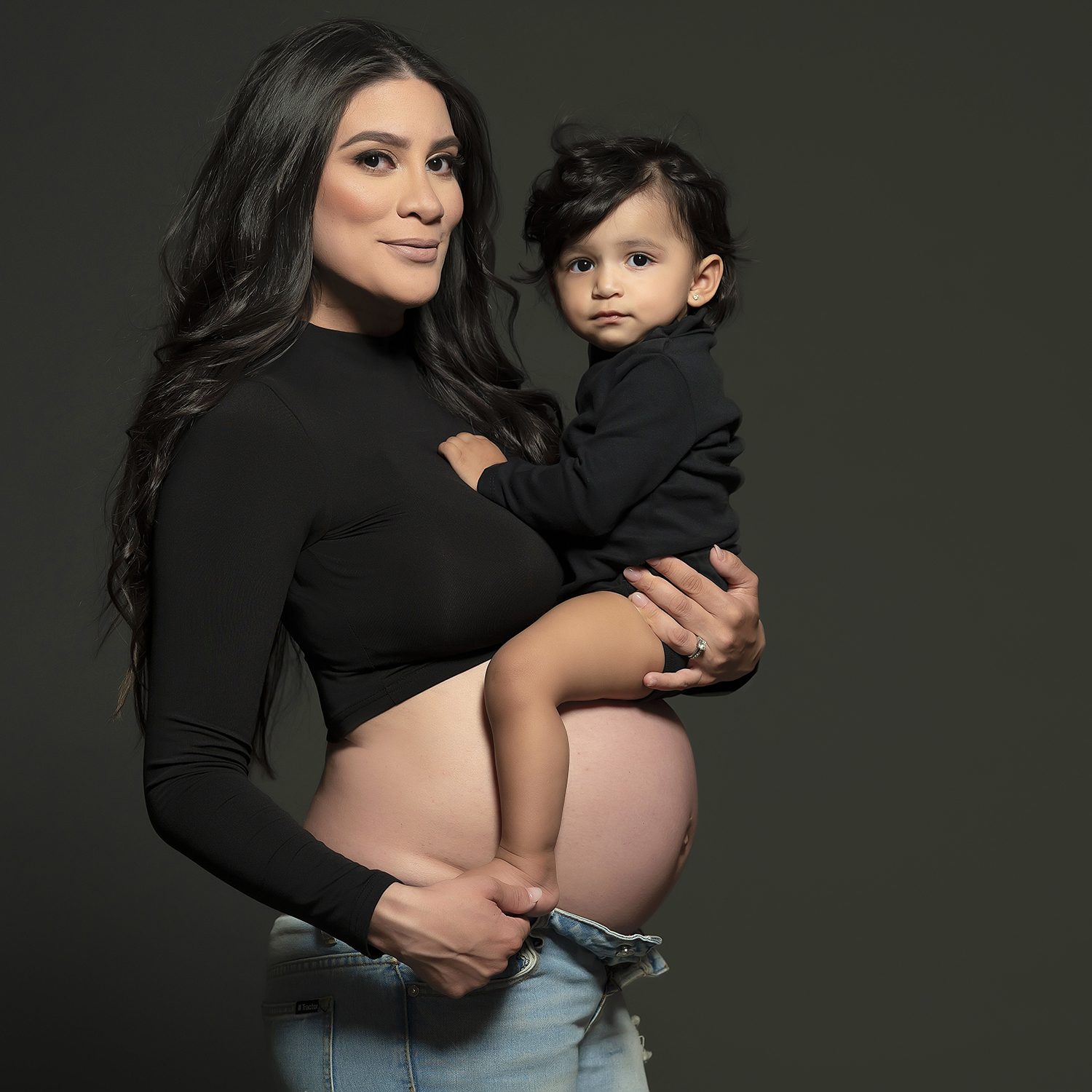 studio maternity session with one child